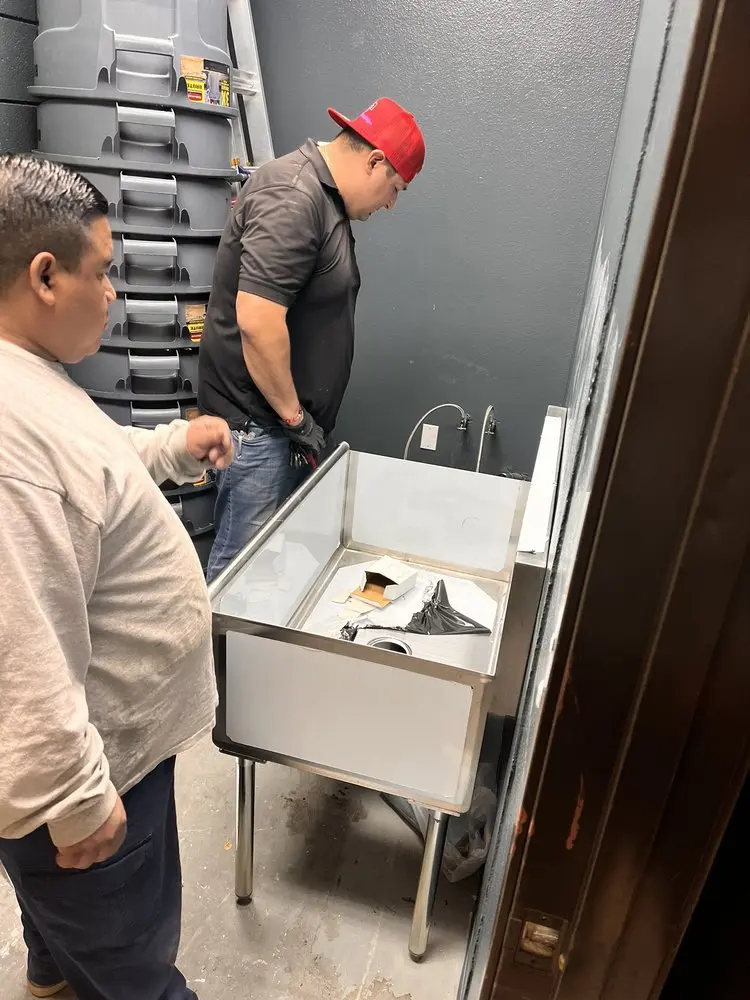 Commercial plumbing and sink installation in Shirley